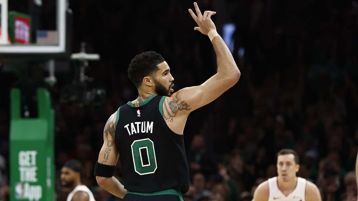 Boston Celtics forward Jayson Tatum (0) celebrates a three point basket against the Miami Heat during the first quarter of game five of the first round of the 2024 NBA playoffs at TD Garden