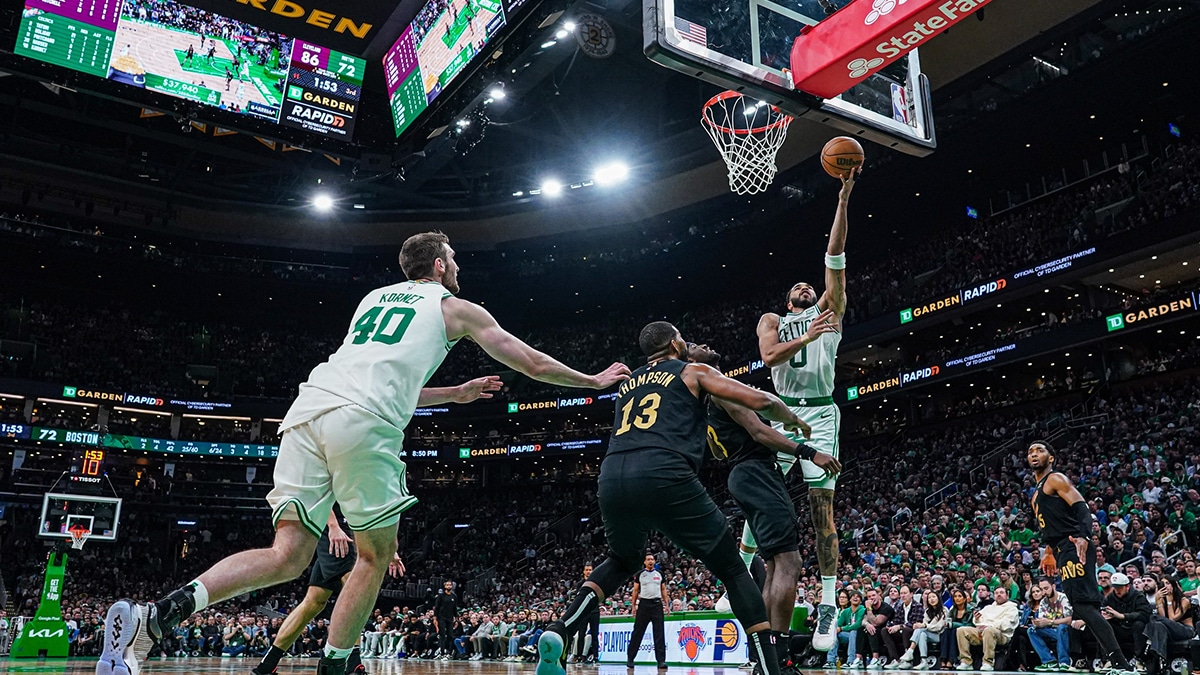 Boston Celtics forward Jayson Tatum (0) drives to the basket against the Cleveland Cavaliers in the second half during game two of the second round for the 2024 NBA playoffs at TD Garden. 