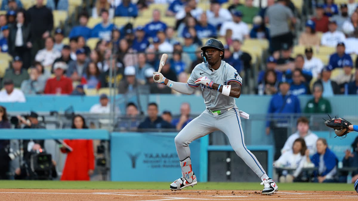Miami Marlins outfielder Jazz Chisholm Jr. (2) hits a single during the first inning against the Los Angeles Dodgers at Dodger Stadium.