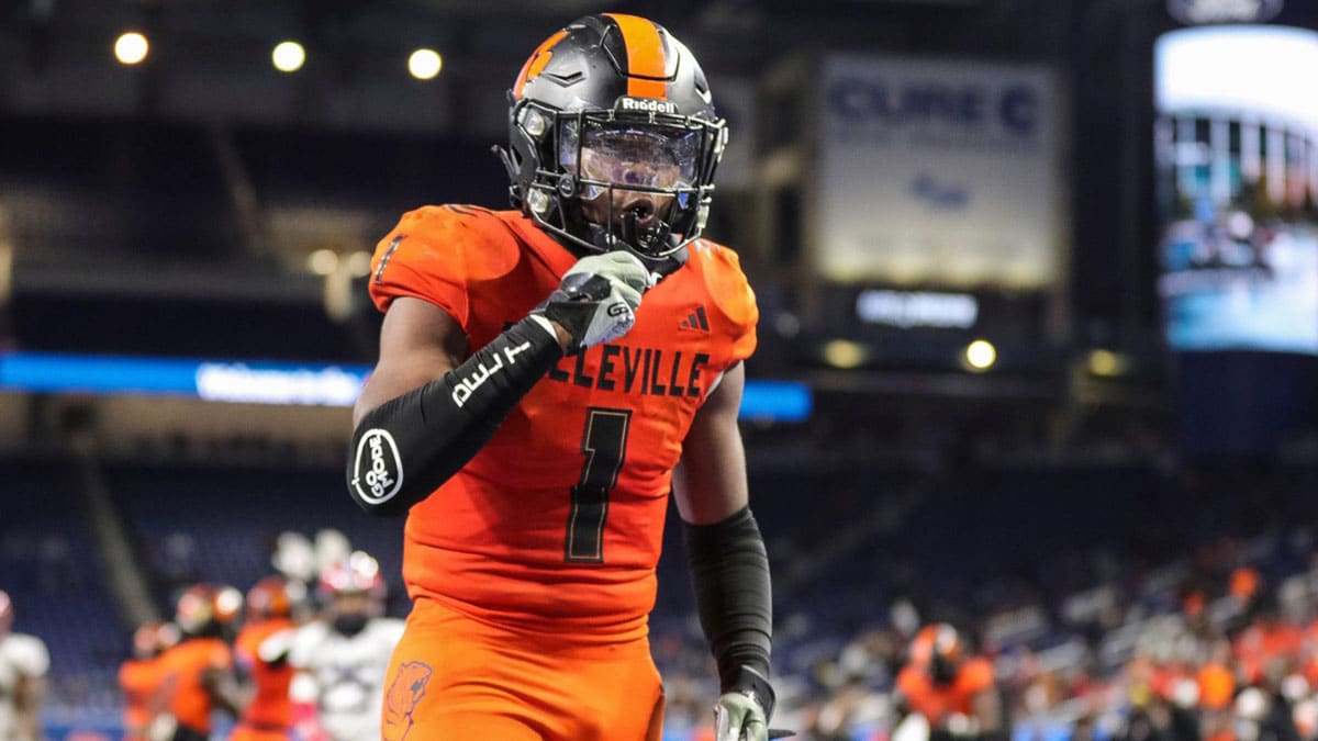 Belleville running back Jeremiah Beasley celebrates a touchdown against Southfield A&T during the second half of the Division 1 state final at Ford Field