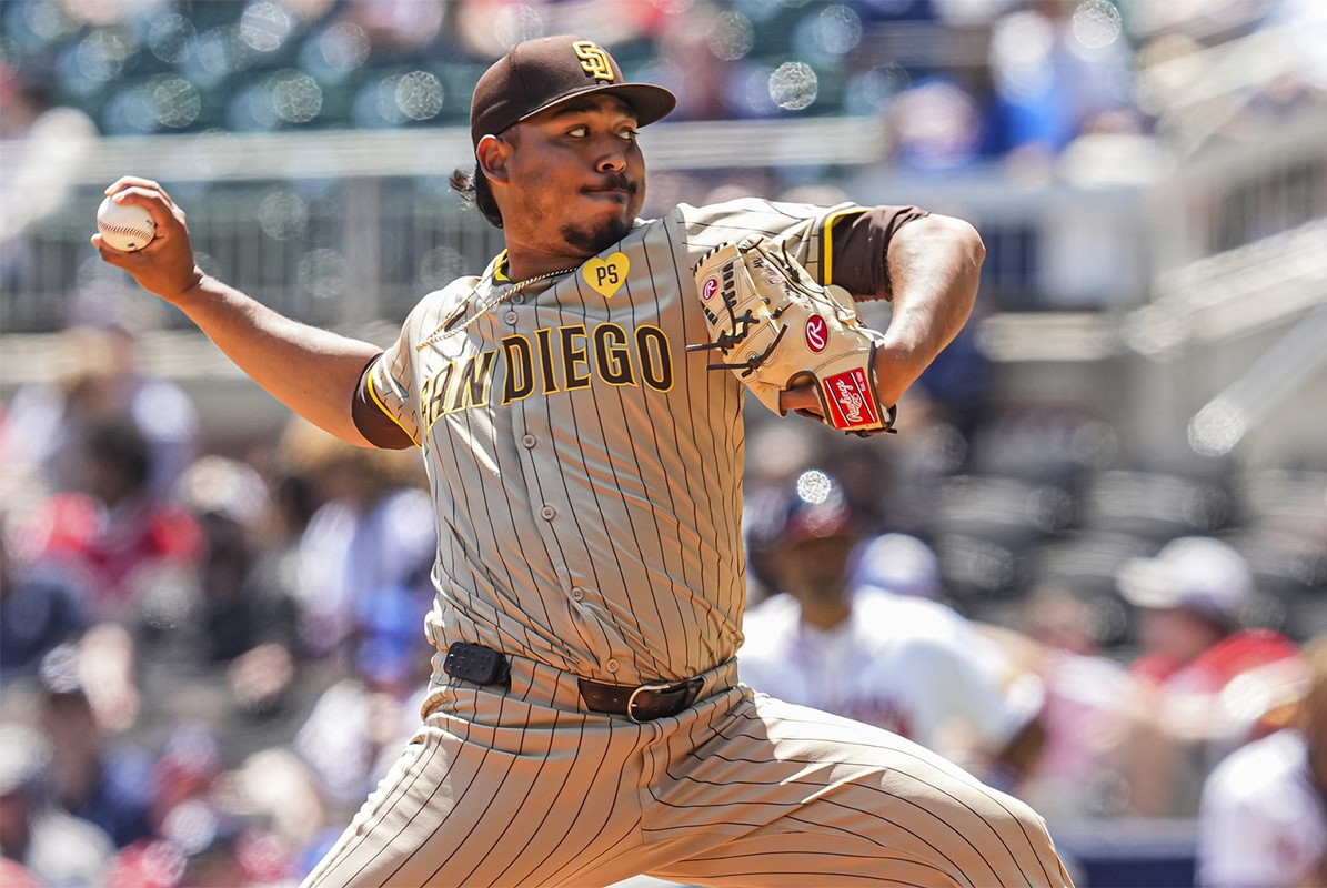 San Diego Padres relief pitcher Jeremiah Estrada (56) pitches against the Atlanta Braves during the eighth inning at Truist Park.