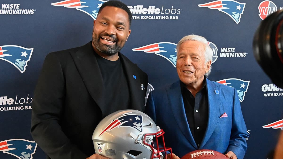 New England Patriots head coach Jerod Mayo (L) and owner Robert Kraft pose for photos after a press conference announcing Mayo's hiring as the team's head coach at Gillette Stadium.