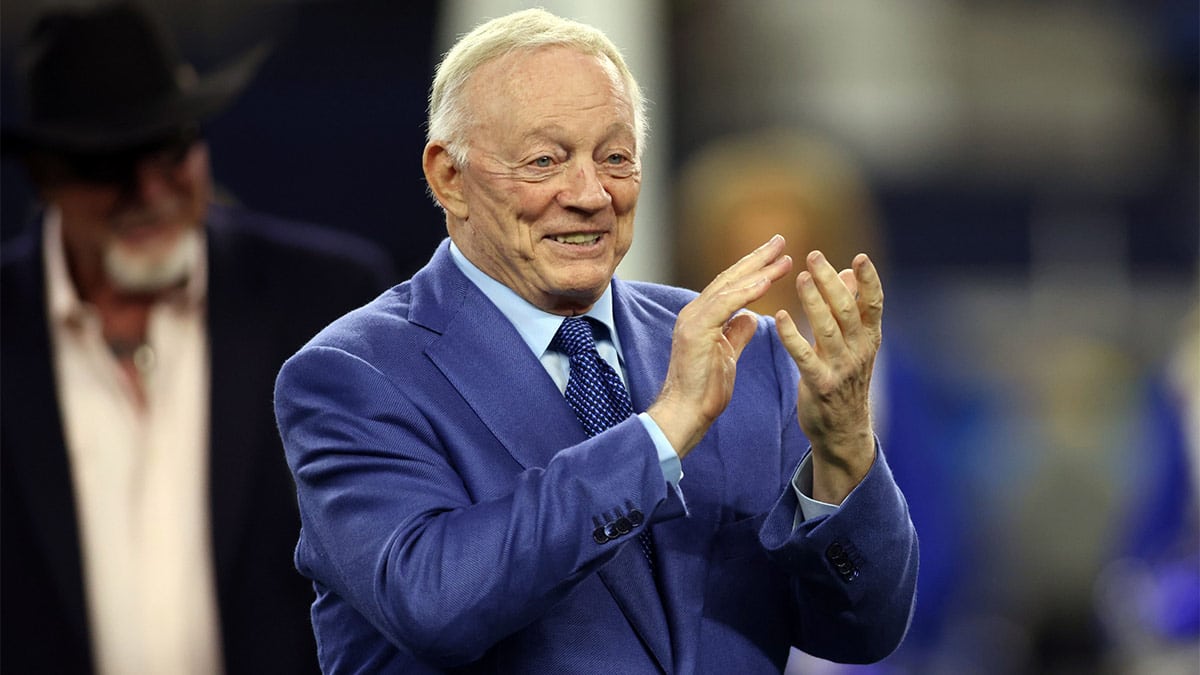 Dallas Cowboys owner Jerry Jones applauds during the Ring of Honor induction ceremony at half time in the game against the Detroit Lions at AT&T Stadium.