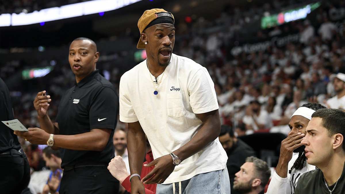 Miami Heat forward Jimmy Butler (22) comments on the game from the bench during the first quarter of game four of the first round for the 2024 NBA playoffs, against the Boston Celtics, at Kaseya Center.