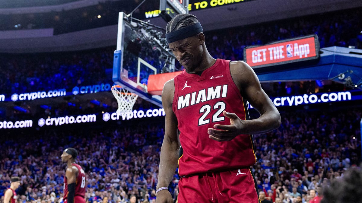 Miami Heat forward Jimmy Butler (22) reacts after a collision during the fourth quarter against the Philadelphia 76ers in a play-in game of the 2024 NBA playoffs at Wells Fargo Center. 