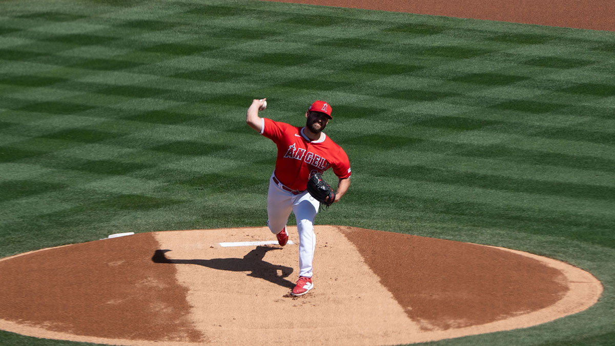 File name: Jimmy Herget pitches during spring training