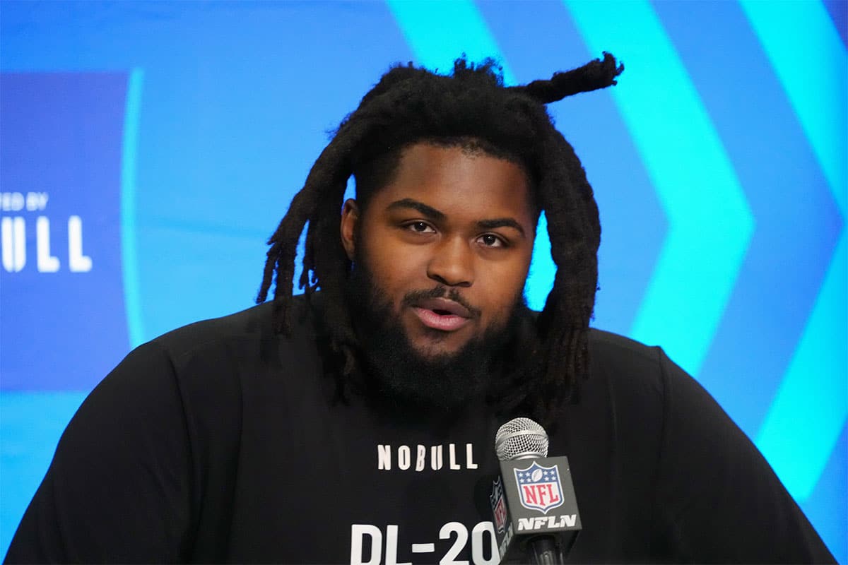 Illinois defensive lineman Johnny Newton (DL20) speaks at a press conference at the NFL Scouting Combine at Indiana Convention Center.