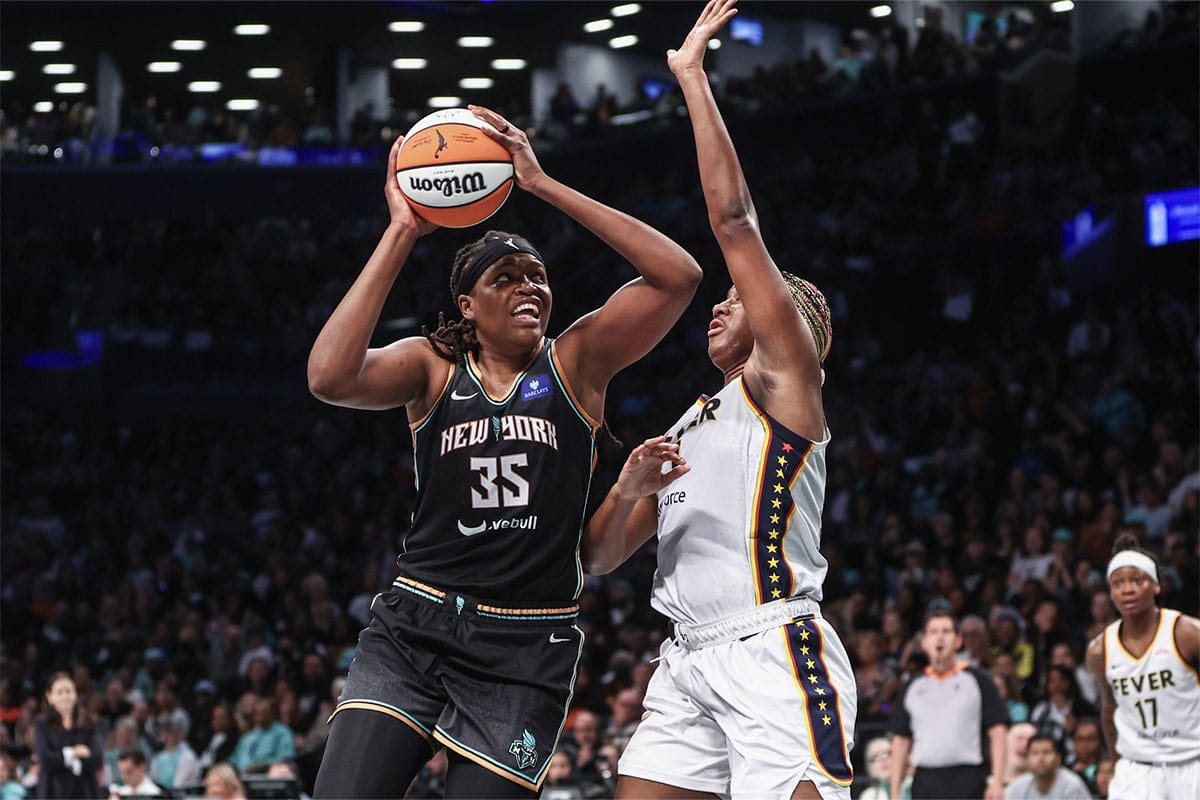 New York Liberty forward Jonquel Jones (35) looks to post up against Indiana Fever forward Aliyah Boston (7) in the fourth quarter at Barclays Center. 