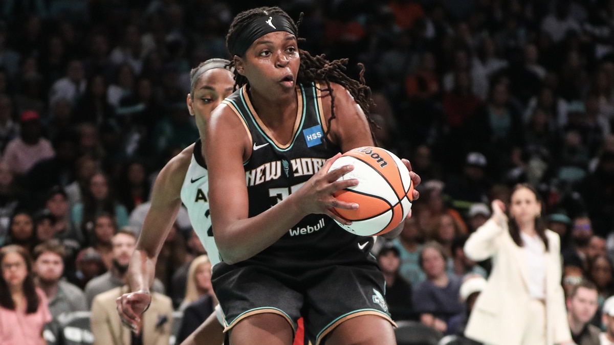New York Liberty forward Jonquel Jones (35) grabs a rebound against the Las Vegas Aces in the second quarter during game three of the 2023 WNBA Finals.