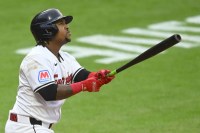 Cleveland Guardians third baseman Jose Ramirez (11) watches his solo home run in the sixth inning against the Detroit Tigers at Progressive Field.