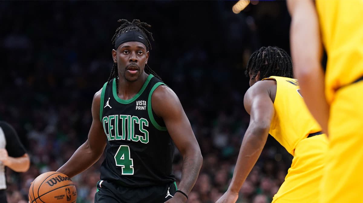 Boston Celtics guard Jrue Holiday (4) dribbles the ball against the Indiana Pacers in the first half during game two of the eastern conference finals for the 2024 NBA playoffs at TD Garden.