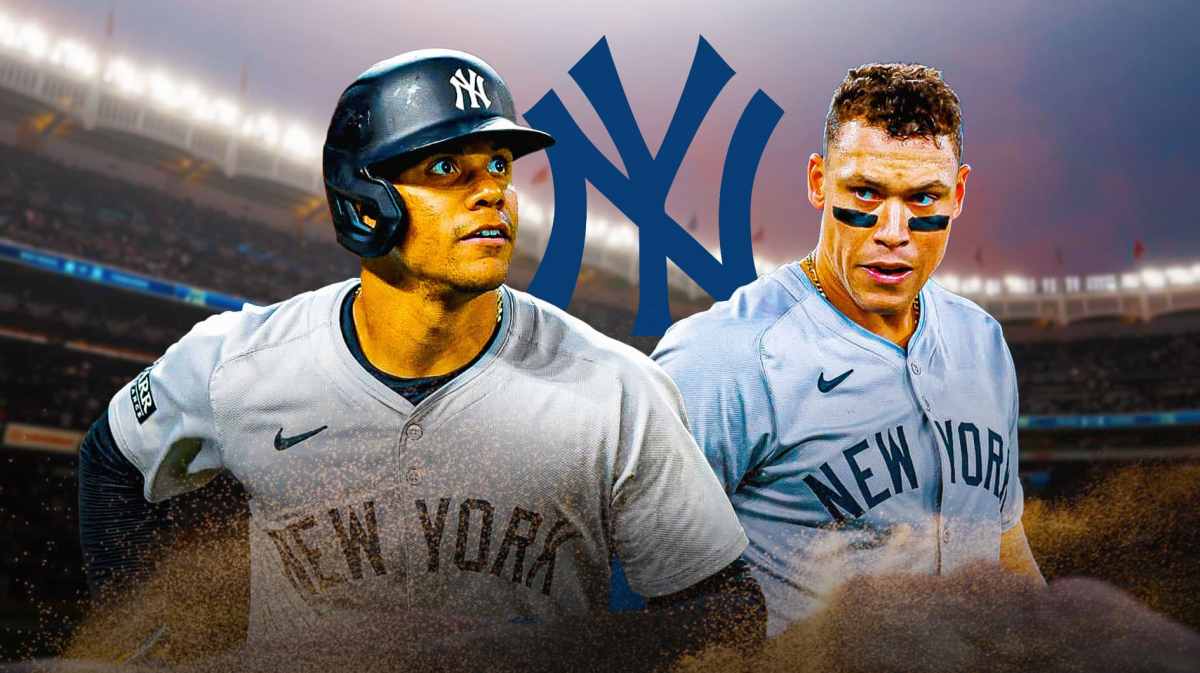 Yankees' Juan Soto stands next to Aaron Judge with Orioles players in the background