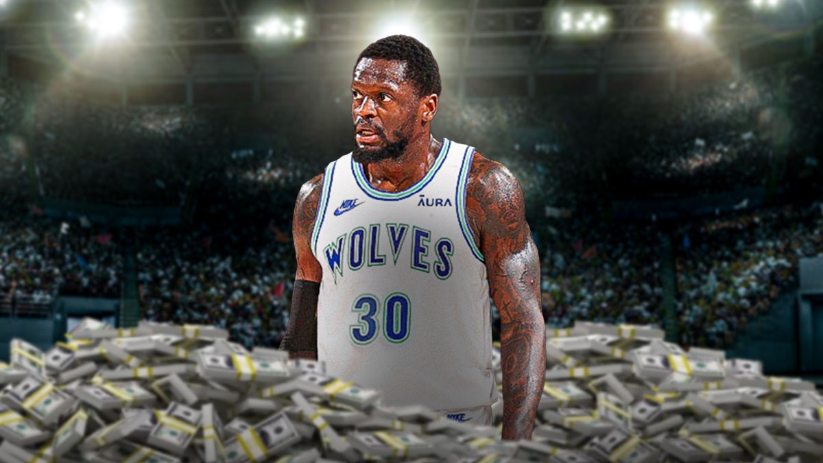 Julius Randle surrounded by piles of cash.