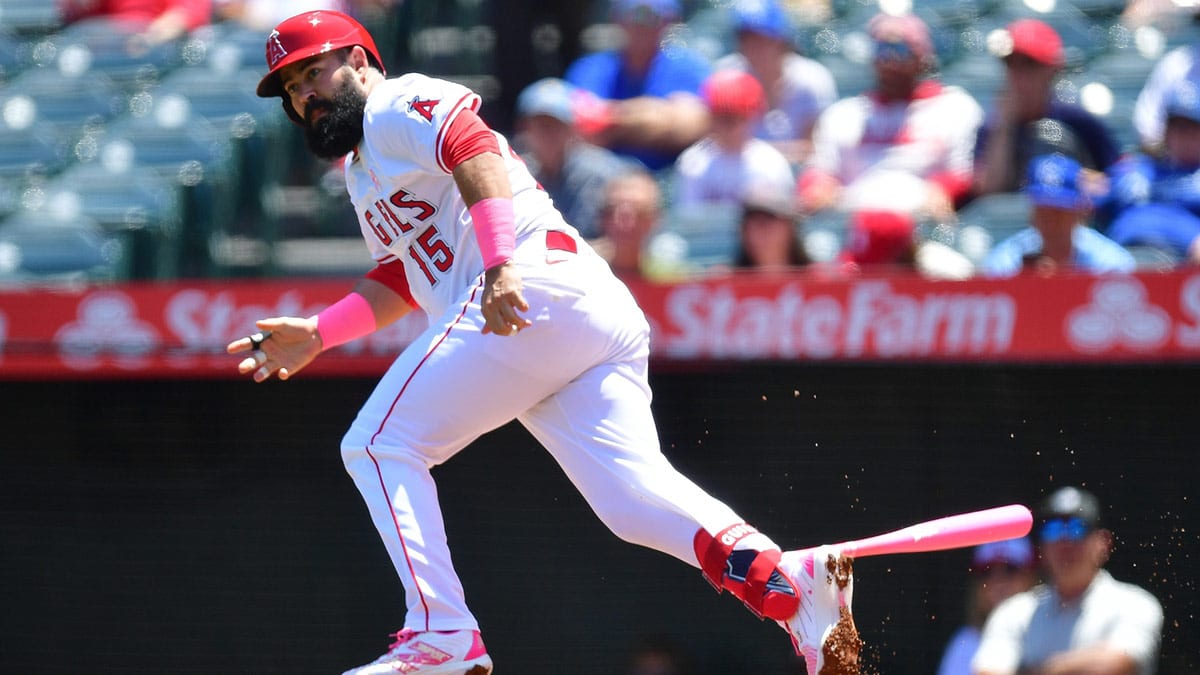  Los Angeles Angels third baseman Luis Guillorme (15) runs after hitting a double against the Kansas City Royals during the first inning at Angel Stadium.