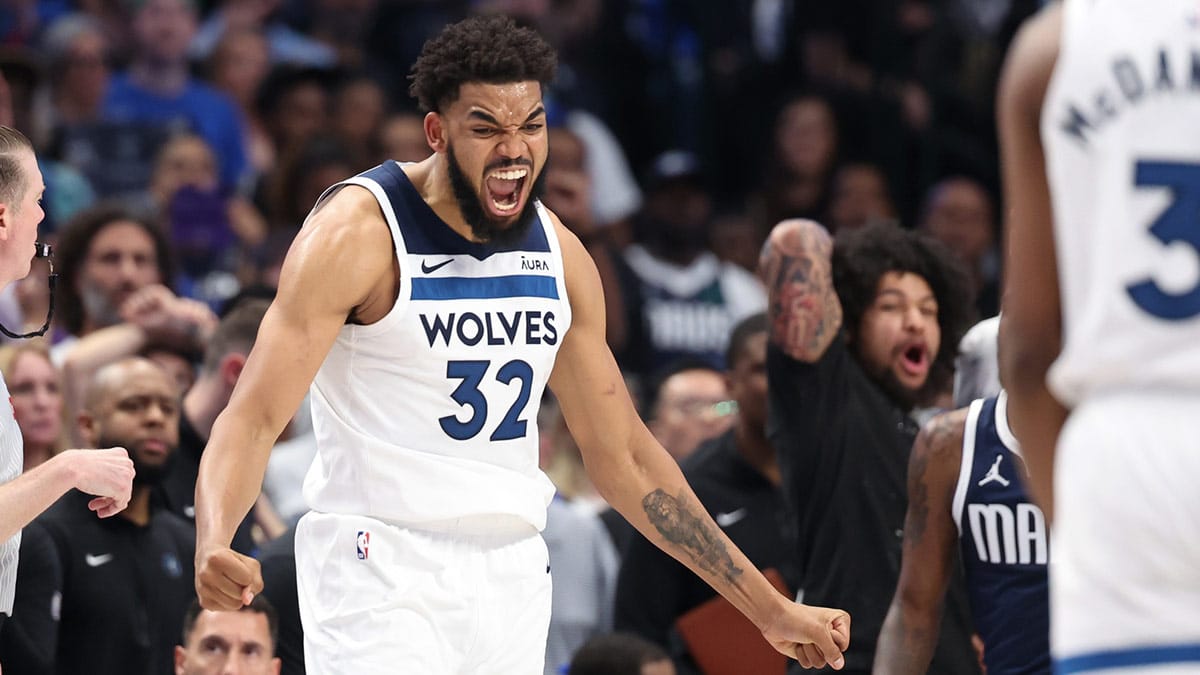 Minnesota Timberwolves center Karl-Anthony Towns (32) reacts during the fourth quarter against the Dallas Mavericks in game four of the western conference finals for the 2024 NBA playoffs at American Airlines Center.