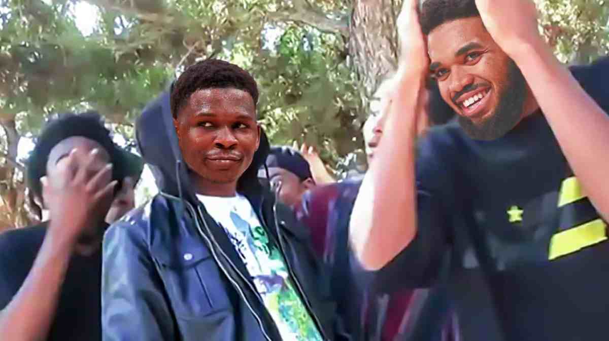 Timberwolves' Anthony Edwards as the guy in the hoodie and Karl-Anthony Towns as the guy on RIGHT with hands on head