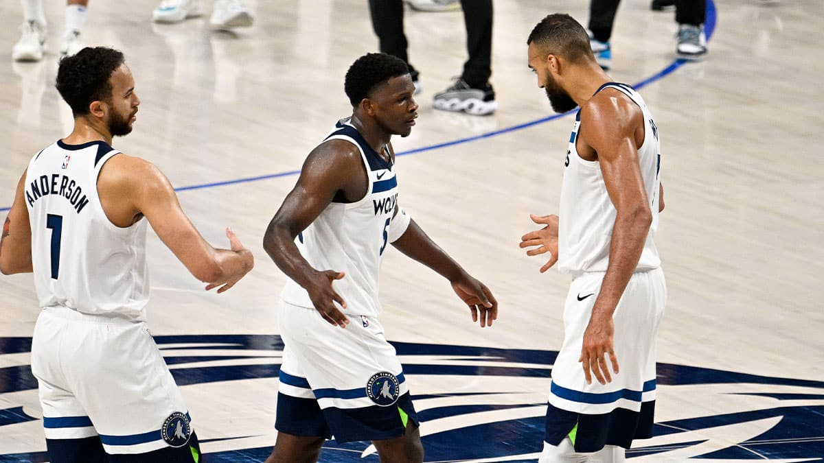  Minnesota Timberwolves forward Kyle Anderson (1) and guard Anthony Edwards (5) and center Rudy Gobert (27) during the second half against the Dallas Mavericks in game four of the western conference finals for the 2024 NBA playoffs at American Airlines Center