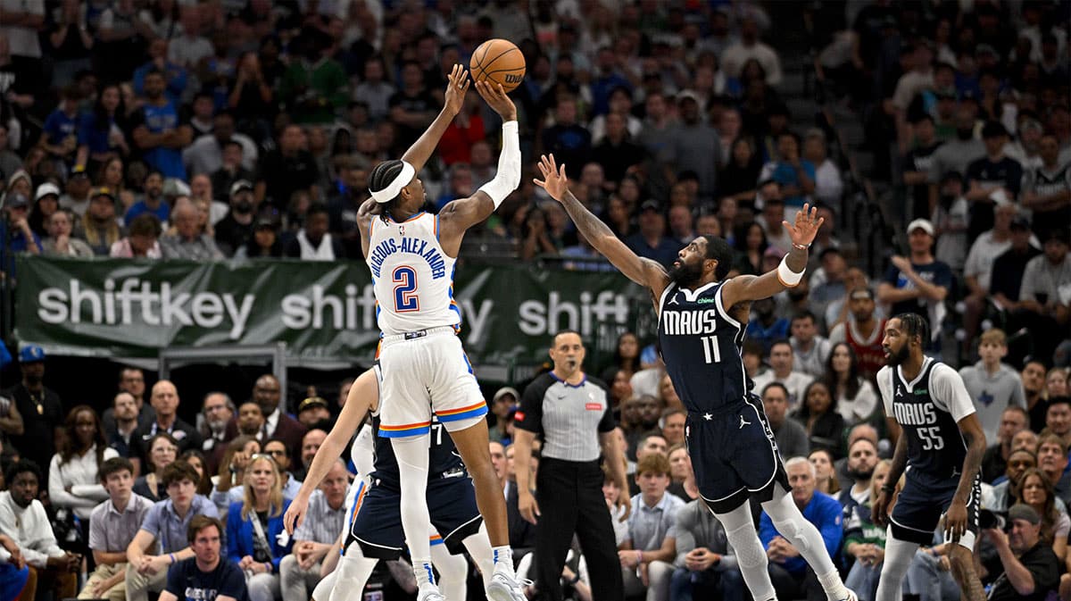 Oklahoma City Thunder guard Shai Gilgeous-Alexander (2) makes a jump shot over Dallas Mavericks guard Kyrie Irving (11) during the second half in game four of the second round for the 2024 NBA playoffs at American Airlines Center. 