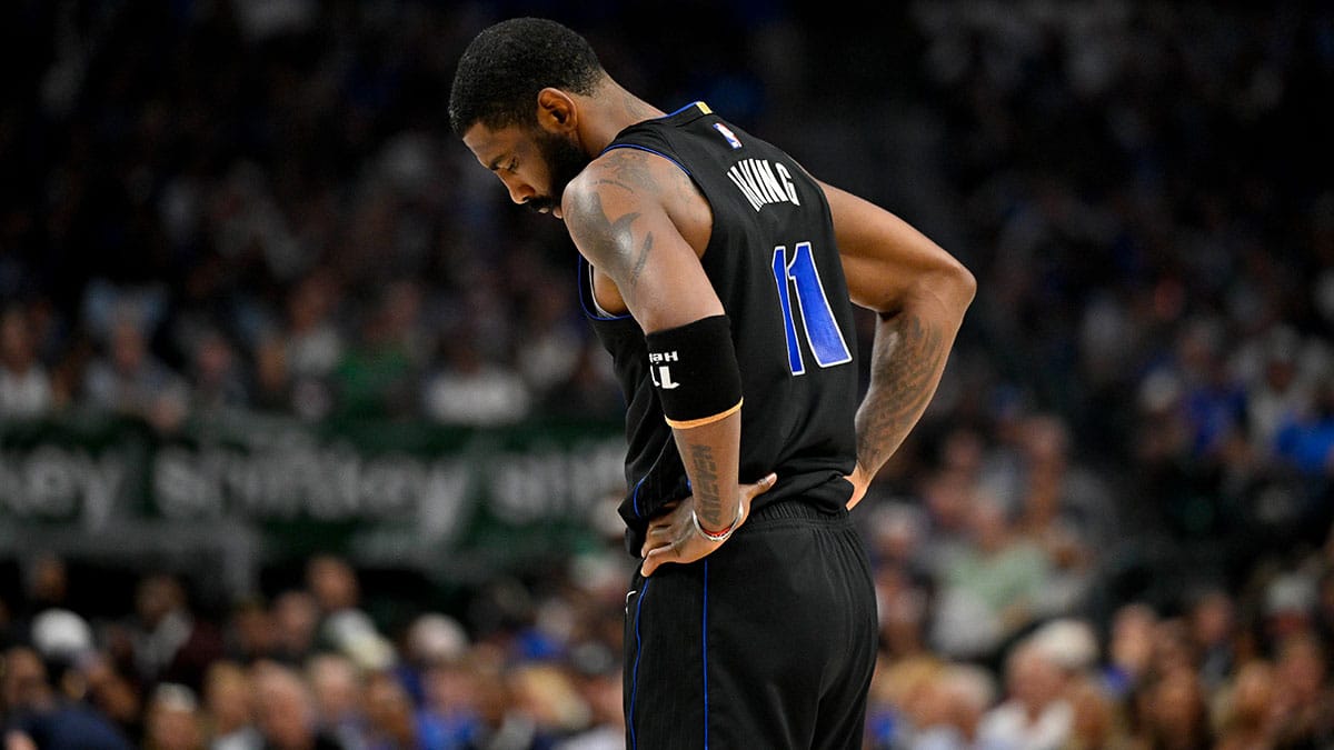 Dallas Mavericks guard Kyrie Irving (11) looks down during the first quarter against the LA Clippers during game six of the first round for the 2024 NBA playoffs at American Airlines Center.
