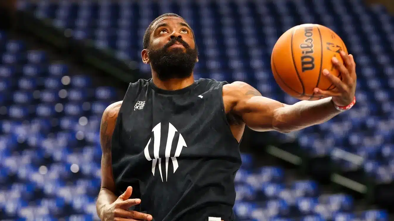 Dallas Mavericks guard Kyrie Irving (11) warms up before the game against the LA Clippers during game four of the first round for the 2024 NBA playoffs at American Airlines Center.