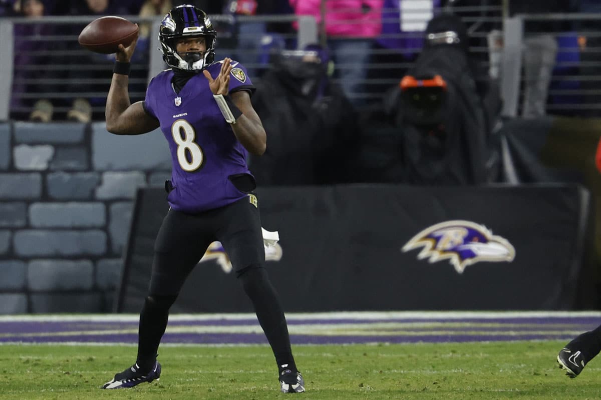 Baltimore Ravens quarterback Lamar Jackson (8) passes the ball against the Kansas City Chiefs in the AFC Championship football game at M&T Bank Stadium.