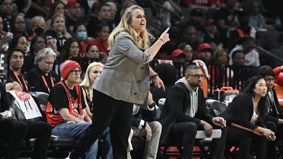 Las Vegas Aces head coach Becky Hammon speaks to her players on the court during the first half in game one of the 2023 WNBA Finals against the New York Liberty at Michelob Ultra Arena. 