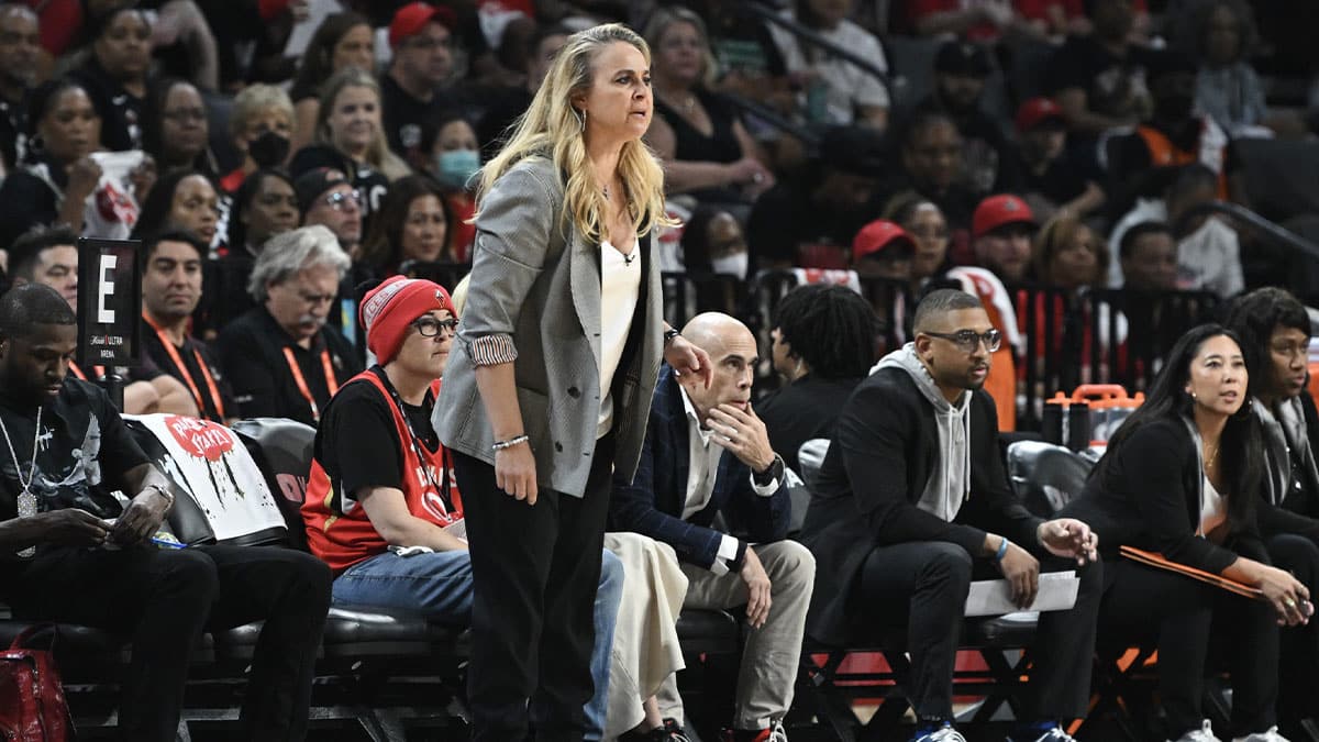 Oct 8, 2023; Las Vegas, Nevada, USA; Las Vegas Aces head coach Becky Hammon speaks to her players on the court during the first half in game one of the 2023 WNBA Finals against the New York Liberty at Michelob Ultra Arena. Mandatory Credit: Candice Ward-USA TODAY Sports