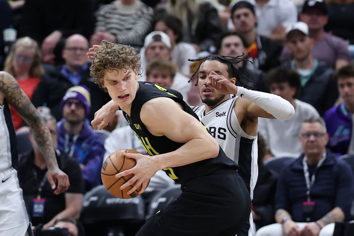 Utah Jazz forward Lauri Markkanen (23) spins to the basket against San Antonio Spurs guard Tre Jones (33) during the fourth quarter at Delta Center