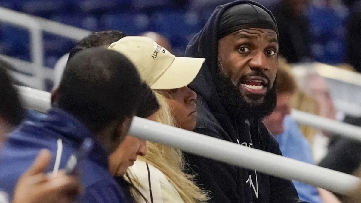 LeBron James and his wife Savannah Brinson watch Bronny James participate in the 2024 NBA Draft Combine at Wintrust Arena.