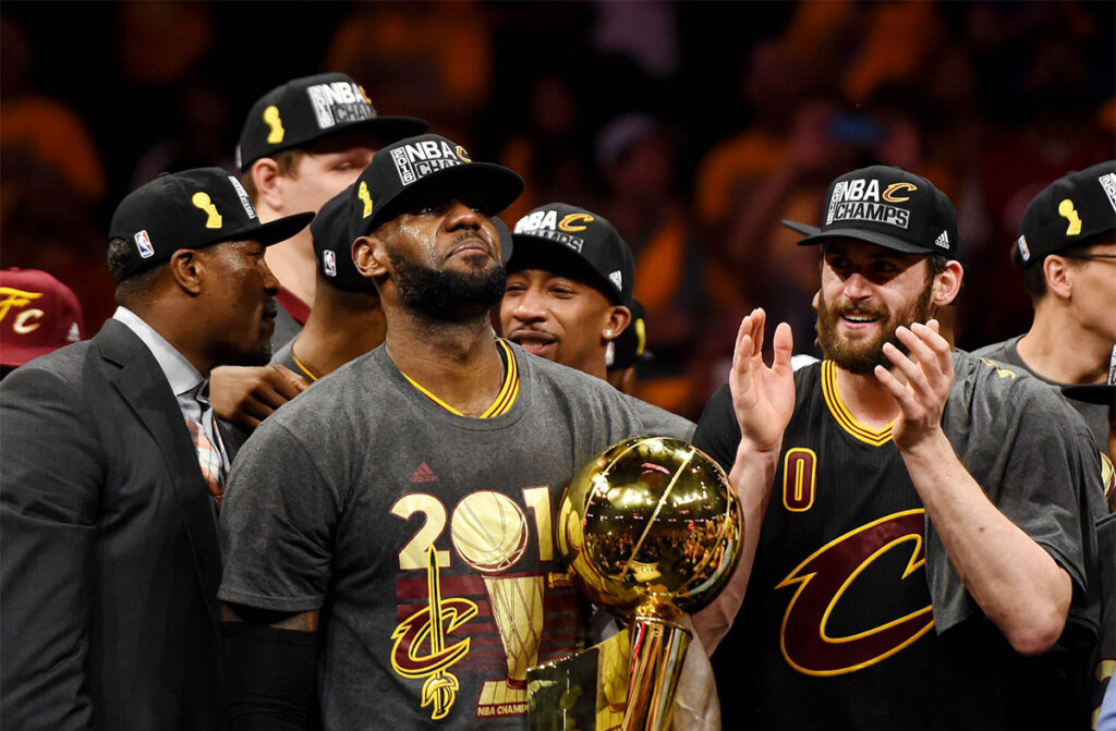 LeBron James holding the Larry O'Brien Trophy after the 2016 NBA Finals