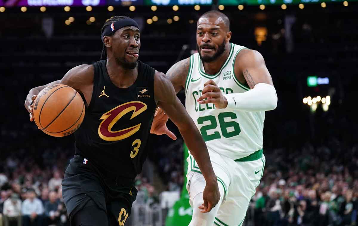 Cleveland Cavaliers guard Caris LeVert (3) drives the ball against Boston Celtics forward Xavier Tillman (26) in the second quarter during game two of the second round for the 2024 NBA playoffs at TD Garden.
