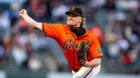 San Francisco Giants starting pitcher Logan Webb (62) delivers a pitch against the Cincinnati Reds during the first inning at Oracle Park.