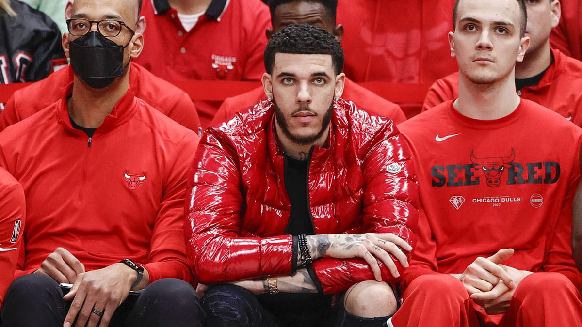 Chicago Bulls guard Lonzo Ball (center) looks on from the bench during the second half of game three of the first round for the 2022 NBA playoffs against the Milwaukee Bucks at United Center. 