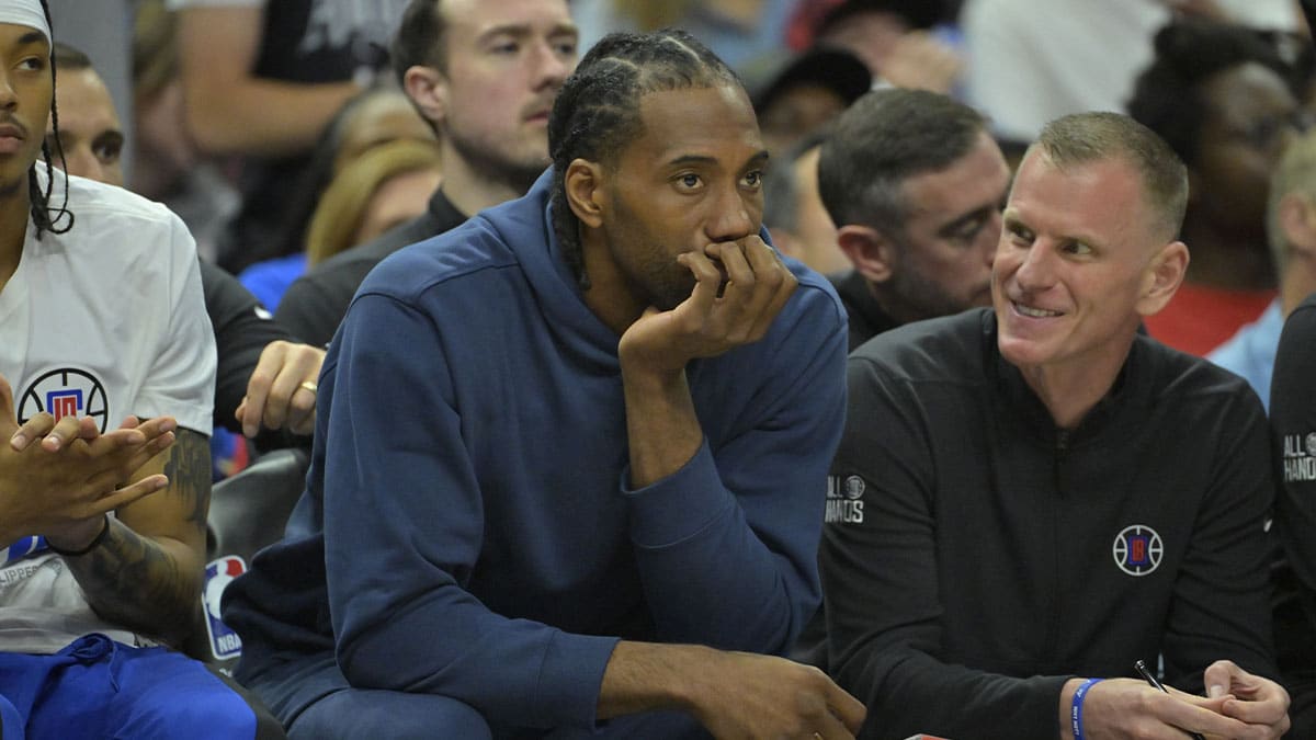 Los Angeles Clippers forward Kawhi Leonard (2) looks on from the bench during game one of the first round for the 2024 NBA playoffs against the Dallas Mavericks at Crypto.com Arena. 