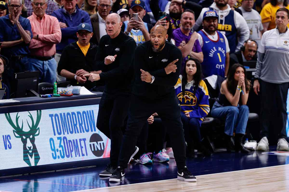 Apr 29, 2024; Denver, Colorado, USA; Los Angeles Lakers head coach Darvin Ham (R) and assistant coach Chris Jent (L) gesture in the fourth quarter against the Denver Nuggets during game five of the first round for the 2024 NBA playoffs at Ball Arena. Mandatory Credit: Isaiah J. Downing-USA TODAY Sports