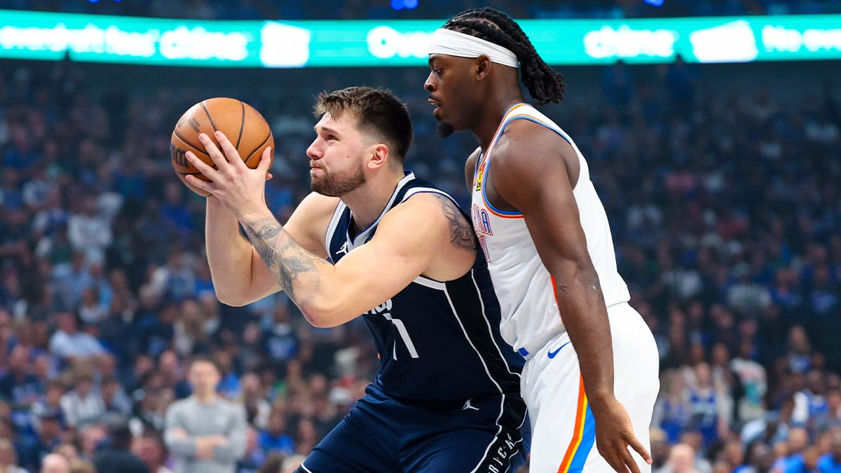Dallas Mavericks guard Luka Doncic (77) shoots past Oklahoma City Thunder guard Luguentz Dort (5) during the first quarter during game three of the second round for the 2024 NBA playoffs at American Airlines Center.