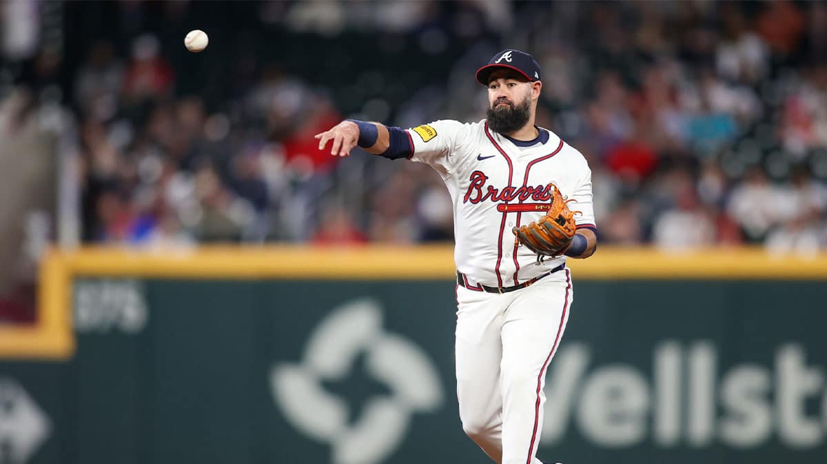 Atlanta Braves second baseman Luis Guillorme (15) throws a runner out at first against the Miami Marlins in the ninth inning at Truist Park.