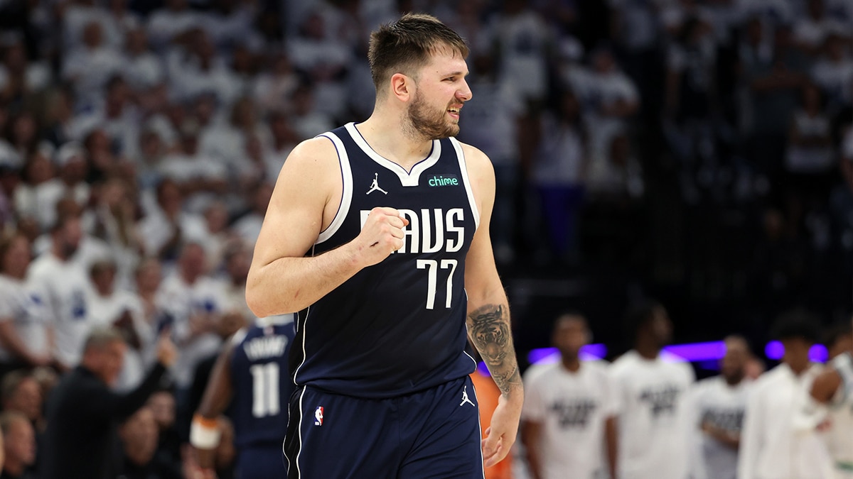 Dallas Mavericks guard Luka Doncic (77) reacts in the fourth quarter against the Minnesota Timberwolves during game one of the western conference finals for the 2024 NBA playoffs at Target Center.