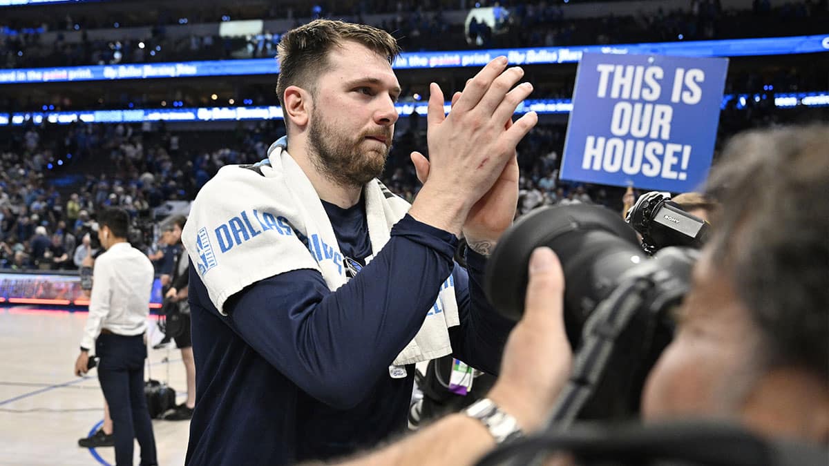 Dallas Mavericks guard Luka Doncic (77) celebrates after the win against the Minnesota Timberwolves in game three of the western conference finals for the 2024 NBA playoffs at American Airlines Center. 