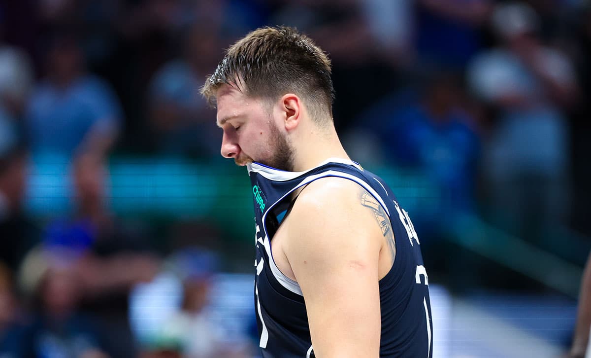 Dallas Mavericks guard Luka Doncic (77) reacts during the fourth quarter against the Minnesota Timberwolves during game four of the western conference finals for the 2024 NBA playoffs at American Airlines Center.