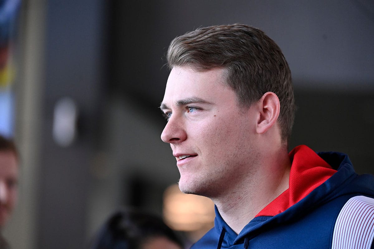 New England Patriots quarterback Mac Jones (10) arrives to a press conference held at Gillette Stadium to announce the team's hiring of new head coach Jerod Mayo (not pictured).
