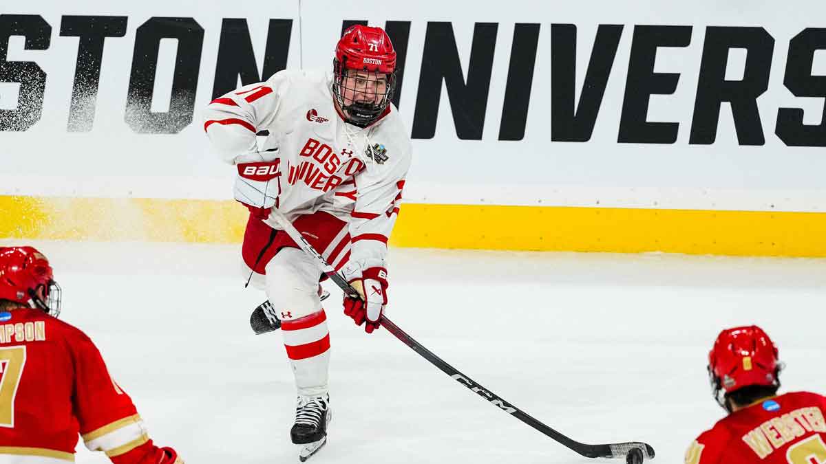 Boston U. forward Macklin Celebrini (71) passes in the semifinals of the 2024 Frozen Four college ice hockey tournament during the third period against Denver at Xcel Energy Center.