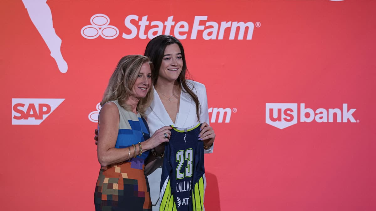 Maddy Siegrist poses for a photo with WNBA Commissioner Cathy Engelbert after being drafted third overall by the Dallas Wings during WNBA Draft 2023 at Spring Studio. 