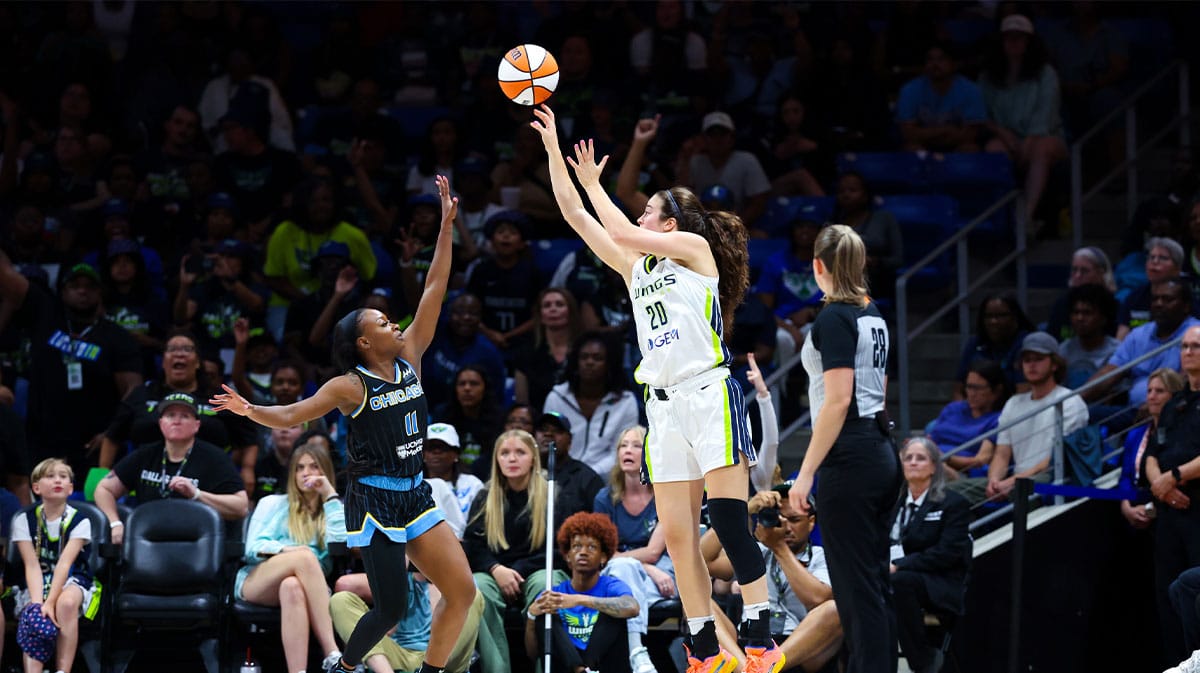 Dallas Wings forward Maddy Siegrist (20) scores over Chicago Sky guard Dana Evans (11) during the second half at College Park Center.