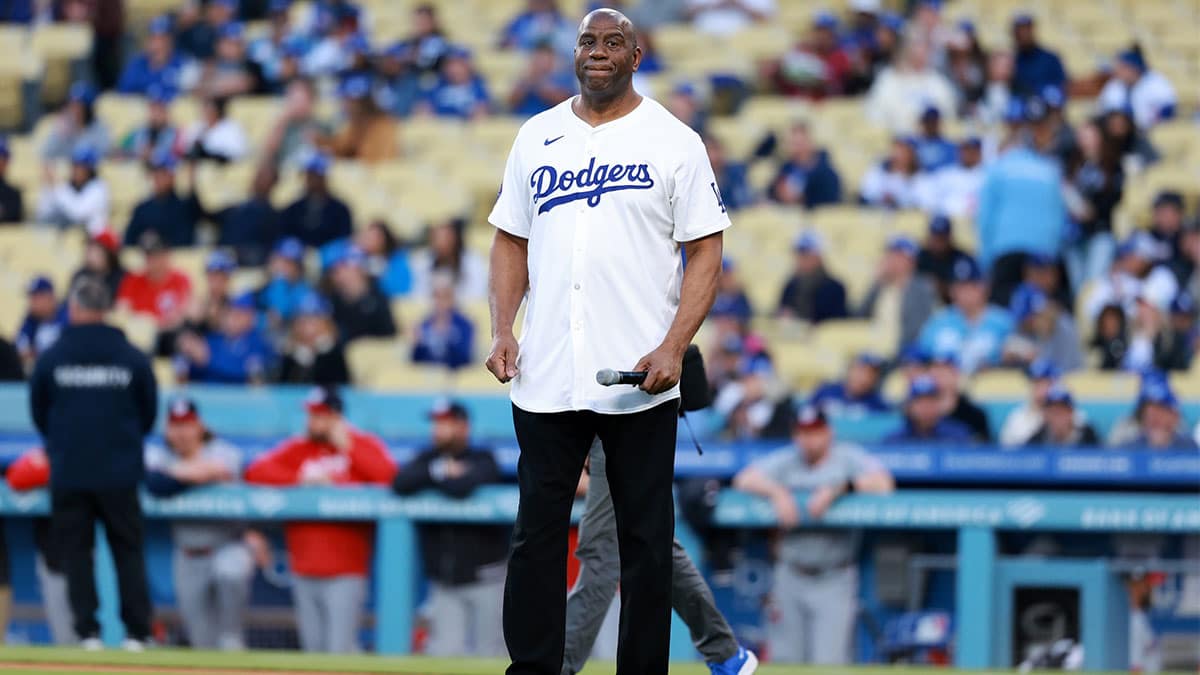 Magic Johnson speaks prior to the MLB game between the Los Angeles Dodgers and the Washington Nationals at Dodger Stadium.