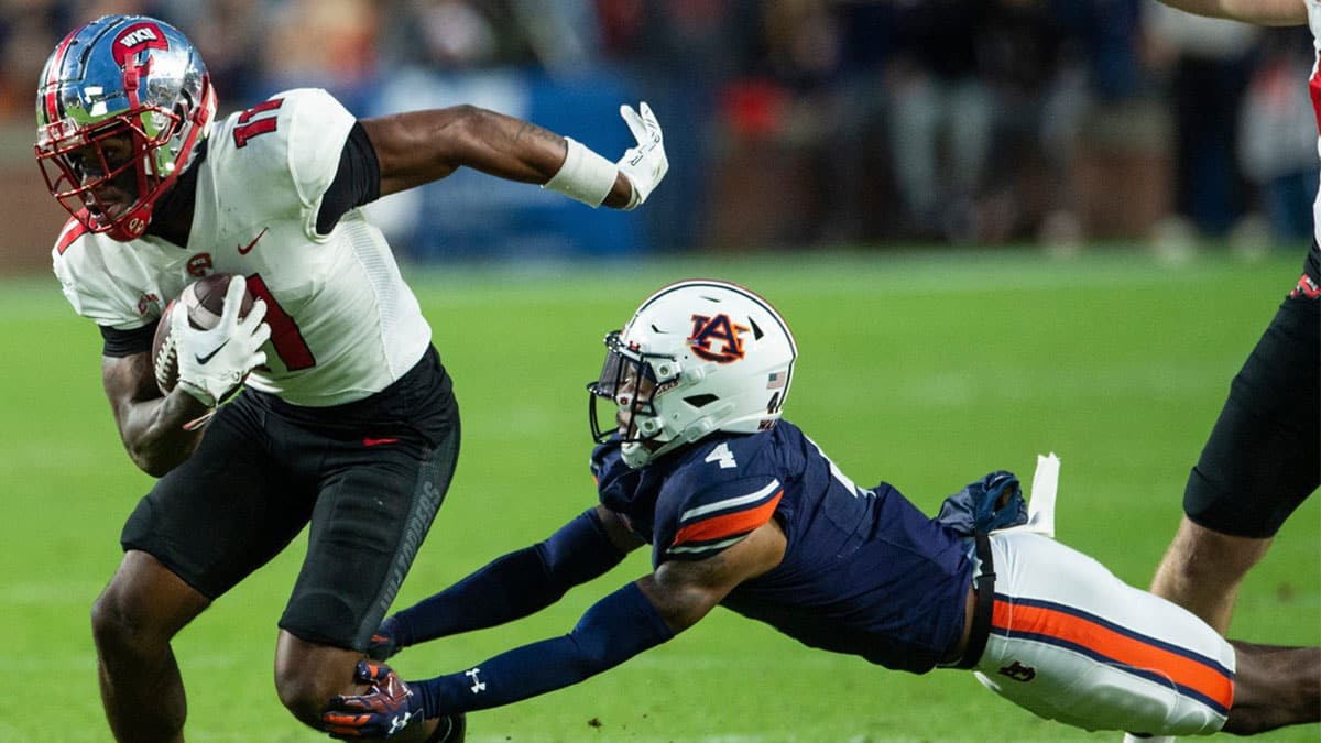 Western Kentucky Hilltoppers wide receiver Malachi Corley (11) turns up field after making a catch as Auburn Tigers take on Western Kentucky Hilltoppers at Jordan-Hare Stadium in Auburn, Ala.