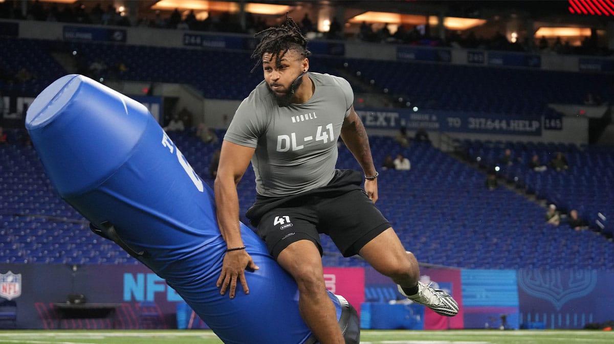 Western Michigan defensive lineman Marshawn Kneeland (DL41) works out during the 2024 NFL Combine at Lucas Oil Stadium