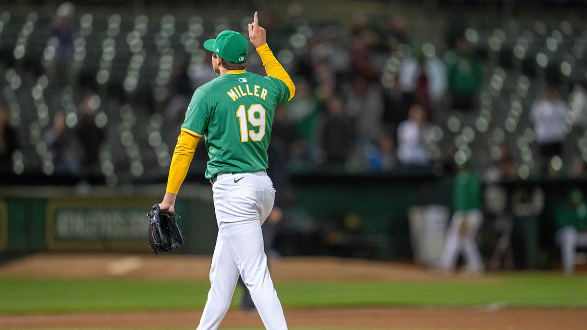 Oakland Athletics pitcher Mason Miller (19) celebrates after the game against the Pittsburgh Pirates at Oakland-Alameda County Coliseum
