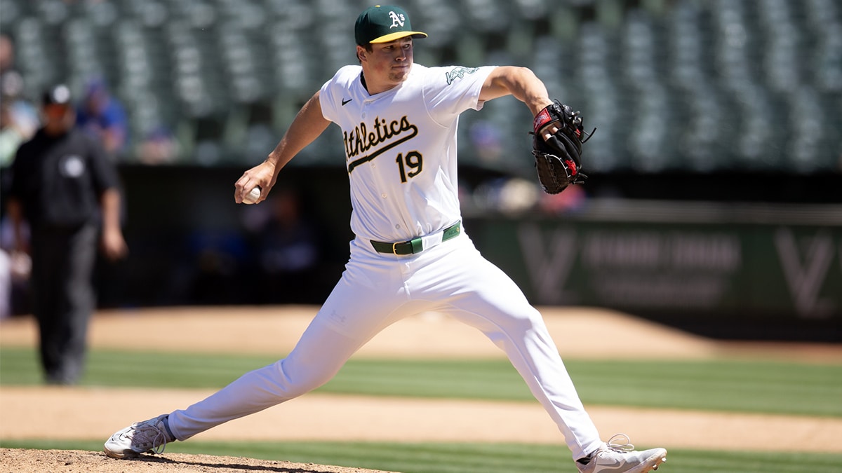 Oakland Athletics pitcher Mason Miller (19) delivers a pitch against the Texas Rangers during the eighth inning at Oakland-Alameda County Coliseum