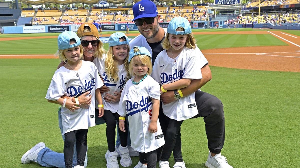 Los Angeles Rams quarterback Matthew Stafford (9) with his wife Kelly with their 4 daughters on the field prior to the game between the Los Angeles Dodgers and the Atlanta Braves at Dodger Stadium. Stafford was at the game on Rams day.